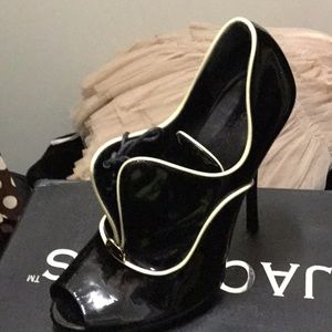 Black patent shoe with white patent stitching